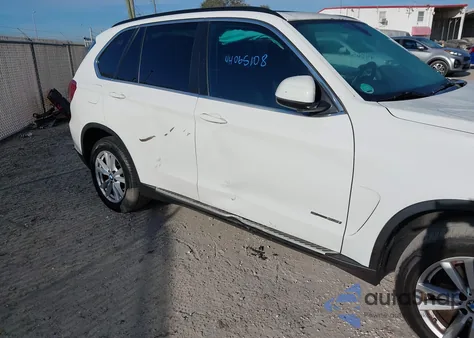 2014 BMW X5 Sdrive35I z USA, uszkodzony, nr VIN 5UXKR2C56E0H31395